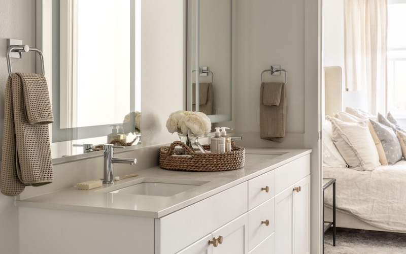 bathroom with backlit mirror 